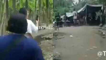 Foto: Tangkapan layar video viral di sosial media menunjukkan seorang wanita memperlihatkan gubuk narkoba dan perjudian di kawasan Sunggal.