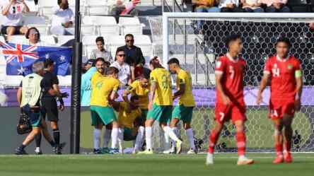 Foto: Australia melaju ke babak 16 besar usai mencetak kemenangan telak.