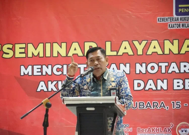 Foto: menyampaikan sambutan