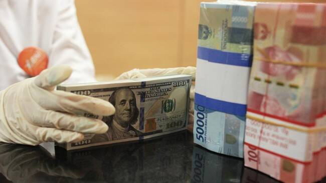 Foto: Nilai tukar rupiah dibuka melemah ke posisi Rp15.785 per dolar AS di perdagangan pasar spot pada Senin (25/3) pagi.