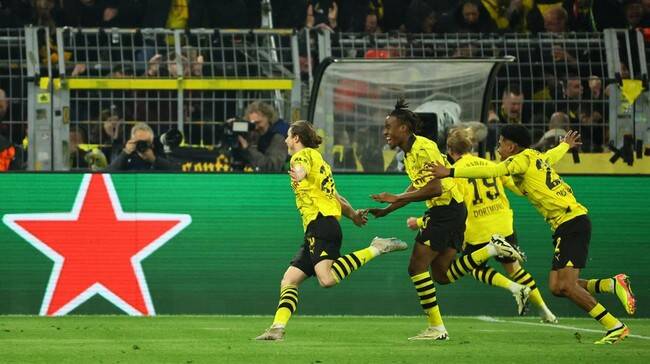 Foto: Pemain Borussia Dortmund merayakan gol kemenangan ke gawang Atletico Madrid.