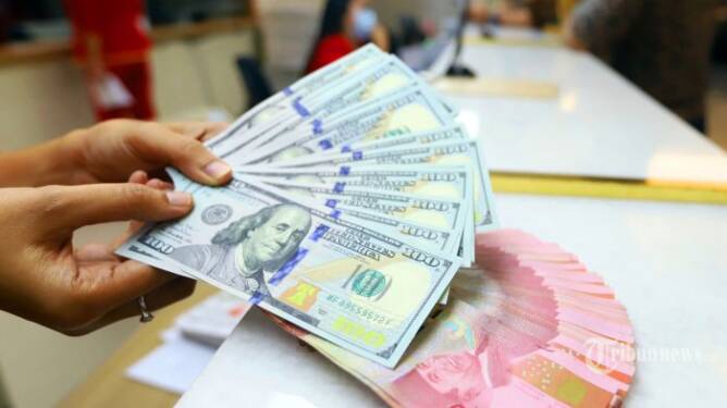 Foto: Nilai tukar rupiah berada di level Rp16.146 per dolar AS pada Rabu (29/5) pagi.