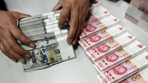 Foto: Dolar dan Yuan.
