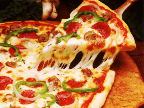 Foto: Piza, salah satu makanan yang memperpendek usia.