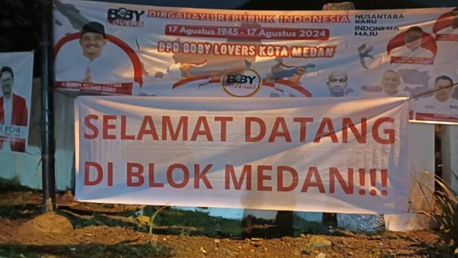 Foto: Penampakan spanduk 'Selamat Datang di Blok Medan!!!' yang terpampang di salah satu sudut Kota Medan, Senin (19/8/2024). (istimewa)
