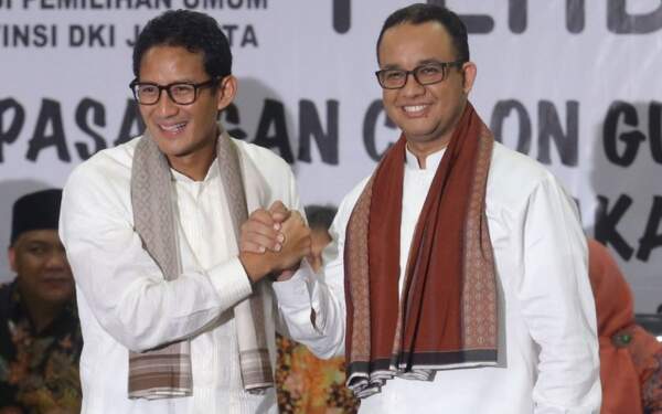 Foto: Anies Baswedan dan Sandiaga Uno.