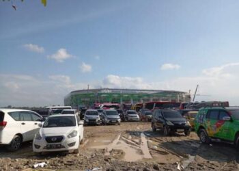 Berkubang Lumpur, Begini Penampakan Area Parkir Kendaraan Atlet PON Sumut