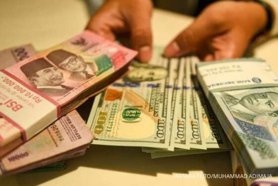 Foto: Nilai tukar rupiah dibuka melemah tipis 0,03 persen ke Rp15.210 per dolar AS pada Rabu (2/10).