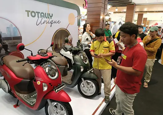 Foto: Antusias tingkat tinggi para bikers pecinta skutik unik dan fashionable menyambut peluncuran New Honda Scoopy yang mengusung konsept “Totally Unique”.(Istimewa)