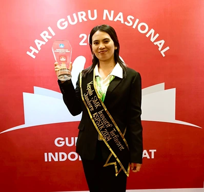Foto: Melda Susanti Sihite, S.Pd, Kepala SMK Sultan Iskandar Muda Medan Sunggal, terpilih sebagai Kepala SMK Inovatif Terfavorit Tingkat Nasional pada Jambore GTK Inovatif 2024 yang diadakan Kemendikdasmen RI, di Menara Peninsula Hotel, Jakarta, Jumat (29/11/2024).(Istimewa).