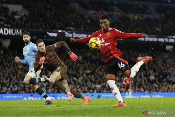Foto: Pembalikan dramatis bahwa MU bungkam City 2-1.