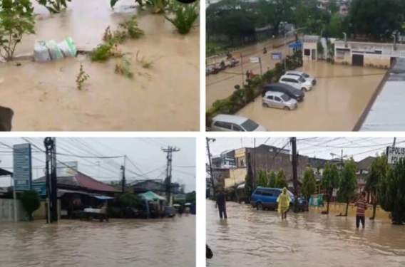 Foto: Dampak meluapnya Sungai Deli serta adanya tanggul yang jebol mengakibatkan sejumlah kawasan jalan dan pemukiman warga terendam banjir.