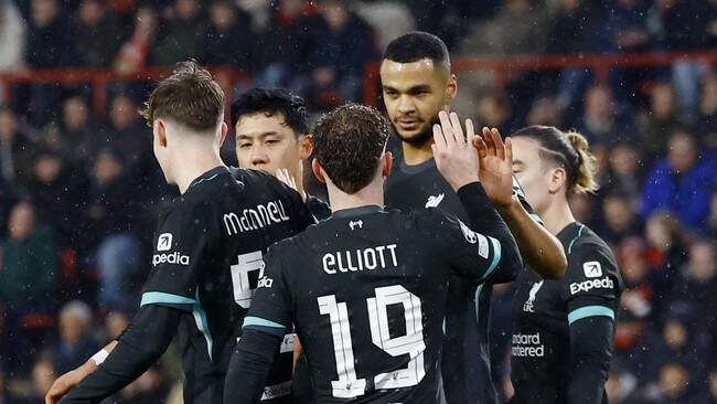 Foto: Liverpool lolos ke babak 16 besar Liga Champions dengan duduk di posisi pertama.