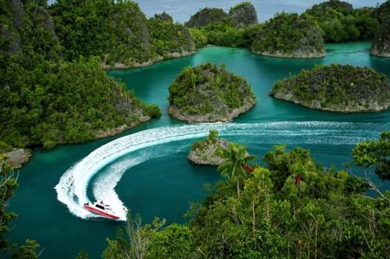 Foto: Raja Ampat dinobatkan jadi destinasi yang wajib dikunjungi tahun 2025.