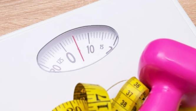 ilustrasi diet atau timbangan berat badan 169