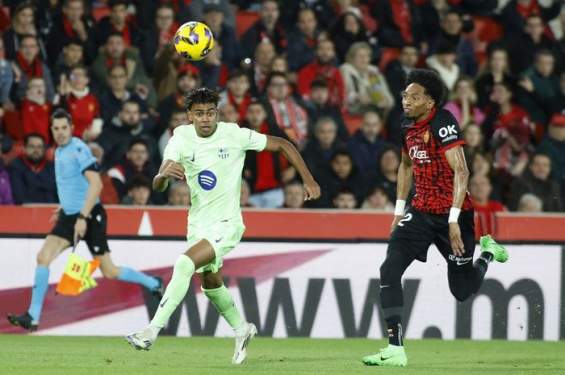 Foto: Penyerang Barcelona Lamine Yamal mengendalikan bola pada pertandingan menghadapi Mallorca.