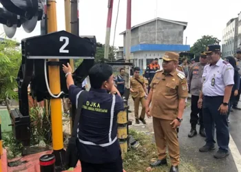 Foto: Tiga Jalur Perlintasan Kereta Api di Asahan Kini Dilengkapi Palang Pintu 7