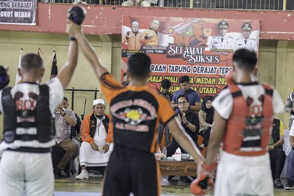 Foto: Wali Kota Medan, Rico Tri Putra Bayu Waas saat menghadiri pembukaan Kejuaraan Tarung Derajat Terbuka Piala Wali Kota Medan 2025.(Dok:Diskominfo Medan)