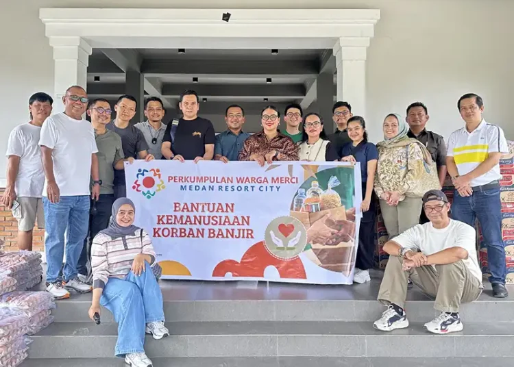 Foto: Perkumpulan Warga Medan Resort City (PWM) Merci melaksanakan kegiatan bantuan kemanusiaan untuk korban banjir.(Ist)