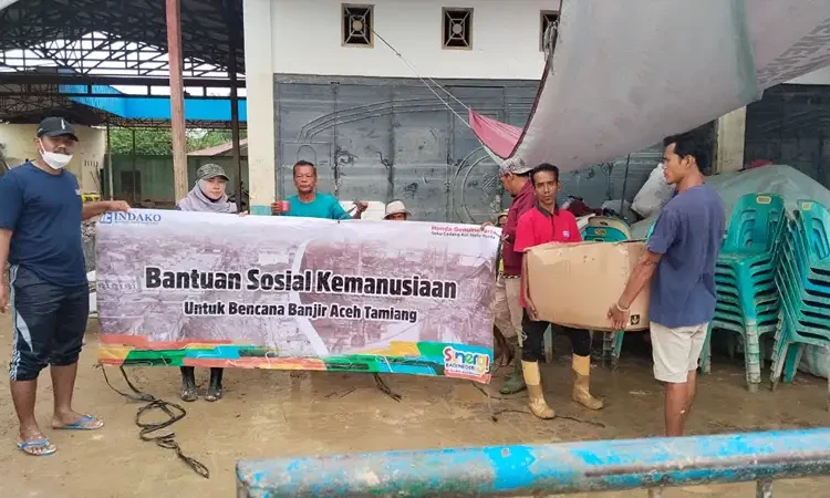 Foto: Honda Genuine Parts bersama PT Indako Trading Coy menyalurkan bantuan pada 13 Desember lalu.(Ist)