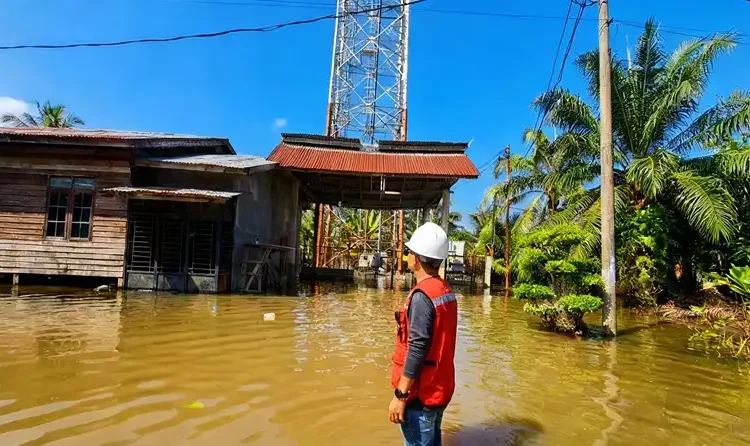 Foto: Indosat menyalurkan paket khusus bencana kepada ratusan ribu pelanggan Tri dan IM3.(Dok:Indosat)